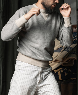 Gray fleece crewneck sweatshirt with ribbed hem and cuffs, V-notch neckline
