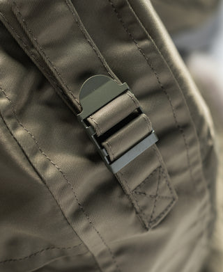 Olive parka belt tab with plastic buckle