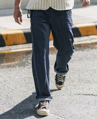 Indigo denim painter pants, relaxed straight legs with cuffed hems