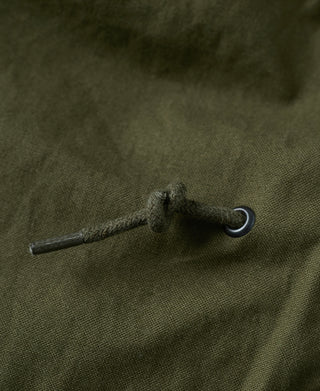 Olive field jacket drawstring with metal eyelet and cord end