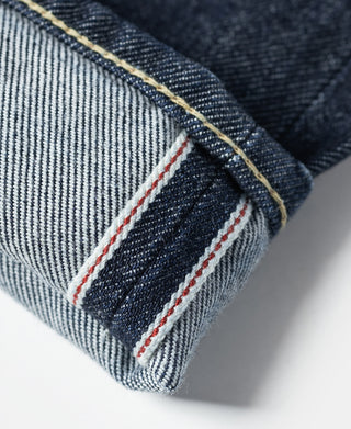 Selvedge denim cuff with red and white edge stripe and gold stitching