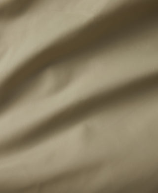 Khaki down parka with faux fur hood trim, front zipper, and chest pockets