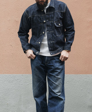 Indigo denim jacket with button front and chest flap pockets