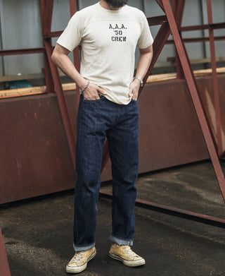 Men's denim jeans, dark wash, straight leg with five-pocket design and tan stitching