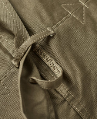 US Army M-42 paratrooper jacket, khaki green pocket flap with button and stitching