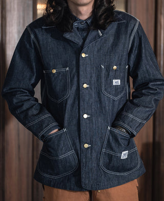 Indigo denim work jacket front view with flap pockets and gold-tone button snaps