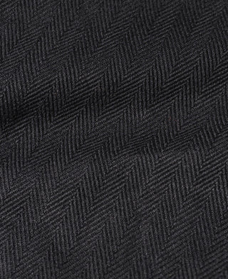 Black textured tour jacket fabric with subtle geometric pattern