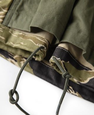 Tiger stripe camo field jacket drawstring hem closeup