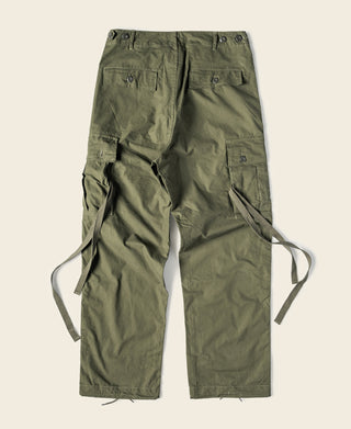 Olive cargo fatigue pants with button fly and side flap pockets