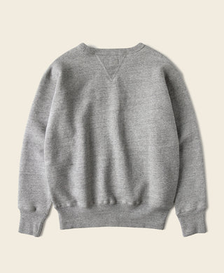 Gray long-sleeve sweater with double V-neck insert, plain front view