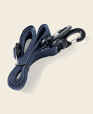 Navy drawstring cord with metal carabiner clip for attaching the chalk bag