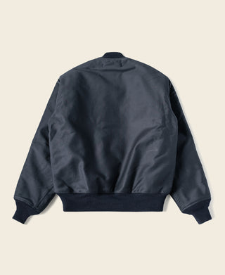 Navy deck jacket back view with ribbed collar and hem, zip closure