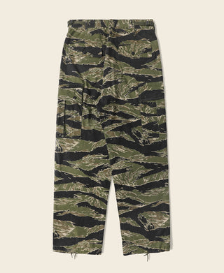 Tiger stripe camo fatigue pants laid flat, straight leg design