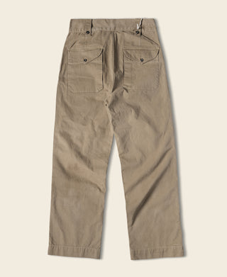 Khaki bermuda shorts with multiple pockets, button front, and pleated waistband
