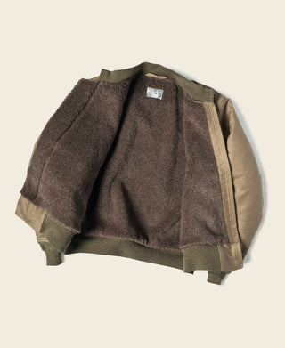 Khaki deck jacket with full-zip front and ribbed knit hem cuffs, rear view