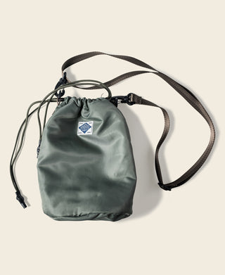 Olive climbing chalk bag with adjustable shoulder strap and black webbing cord
