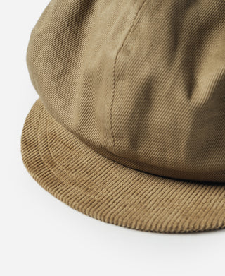 Khaki biker cap close-up, showing ribbed brim edge and stitched crown.