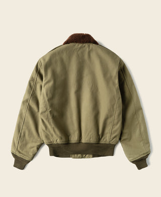 Khaki flight jacket back view with brown shearling collar and ribbed knit waistband hem.