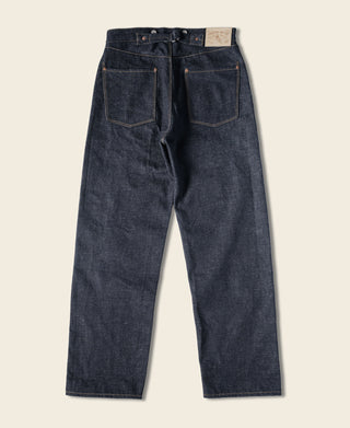 Indigo denim jeans with back yoke and two rear patch pockets