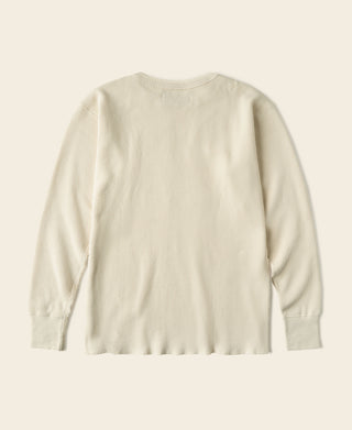 Thermal waffle-knit shirt, crew neck, long sleeves; light apricot/cream back view
