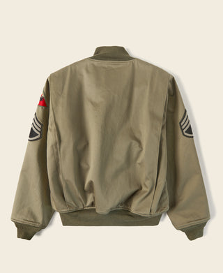 US Army 1st tanker jacket in olive green, back view with ribbed knit cuffs and hem