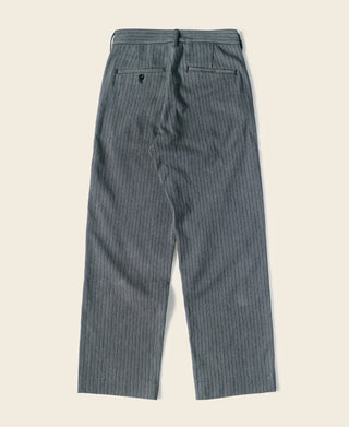 Black-and-gray striped dress pants with belt loops and button closure