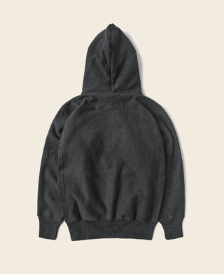 Black pullover hoodie with hood and ribbed hem, back view