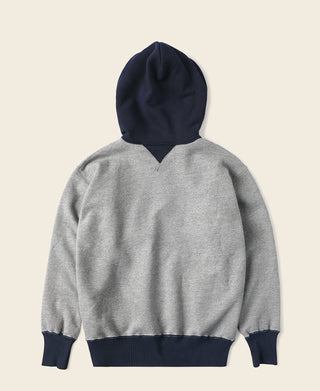 Two-tone hooded sweatshirt, gray back with navy hood and ribbed cuffs