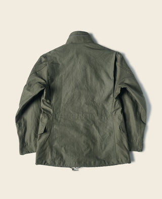 Olive field jacket back view with button-up placket and flap pockets.
