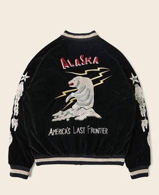 Black reversible souvenir jacket back with Alaska title, eagle art, and “America’s Last Frontier”.