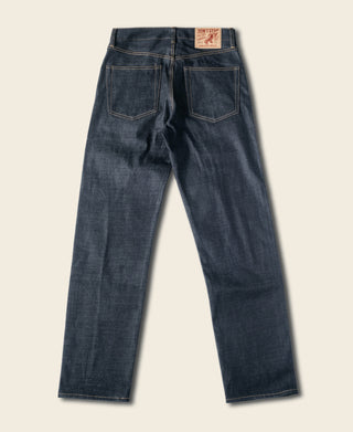 Indigo selvedge denim jeans, back view with belt loops and two-closure waistband