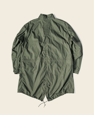 Olive green M-65 style parka back view with utility pockets and button closures