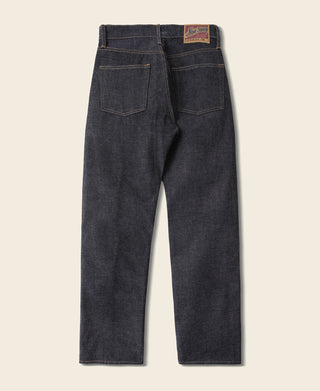 Selvedge denim jeans front view with straight legs and dark indigo wash