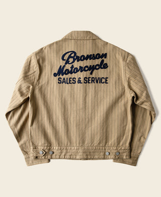 Khaki striped chore coat back with Bronson Motorcycle Sales & Service print