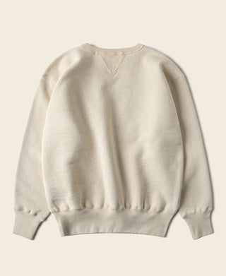 Cream ski sweatshirt with V-inset neckline, ribbed hem and cuffs