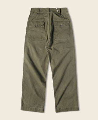 Olive bermuda pants with two front flap pockets, belt loops, and button closure