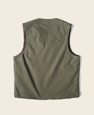 Olive pile-lined zip-front vest, back view with ribbed hem and arm openings