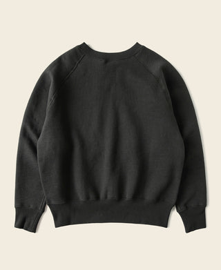 Vintage black raglan-sleeve sweater, plain back view with crew neckline