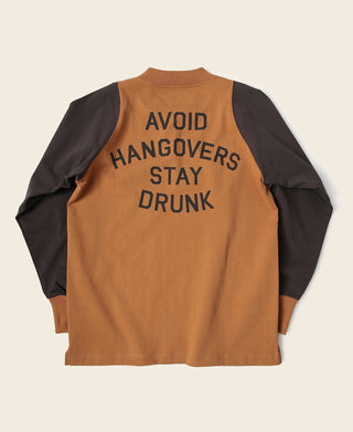 Orange quarter-zip long-sleeve T-shirt with dark contrast sleeves and back text “AVOID HANGOVERS”