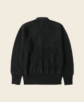 Black V-neck pullover mechanics sweater, ribbed knit hem, back view