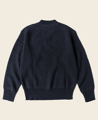 Navy crewneck wool sweater, back view, ribbed collar and hem