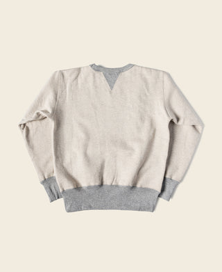 Oatmeal fleece boxing sweatshirt with gray ribbed cuffs and V-neck detail