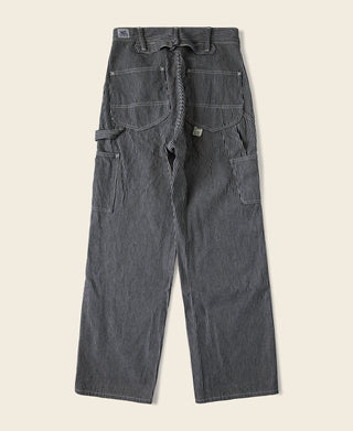 Striped carpenter pants with front and side patch pockets, button-closure waistband.