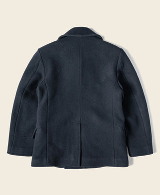 Navy peacoat back view with standing collar and central vertical seam