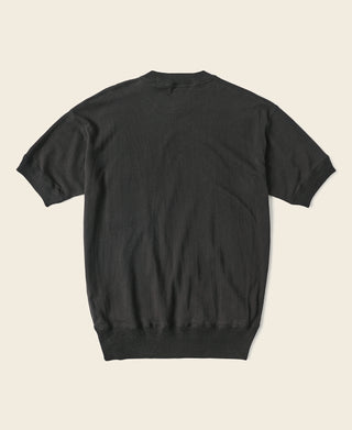 Black waffle-knit pocket t-shirt, back view with crew neck and short sleeves