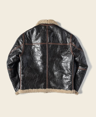 Dark brown leather flight jacket back view with shearling hem and center zip