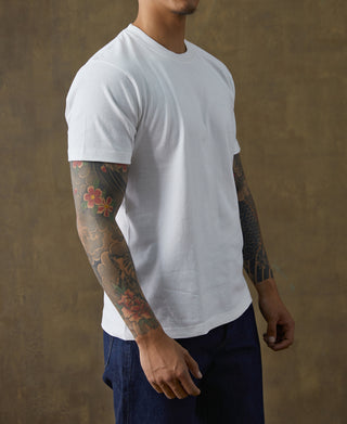 White cotton tubular T-shirt worn on male model, front view