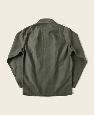 Olive fatigue utility shirt, back view with buttoned placket and long sleeves