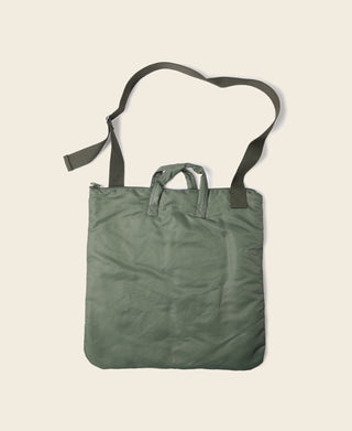 Olive canvas tote bag with adjustable shoulder strap and open top