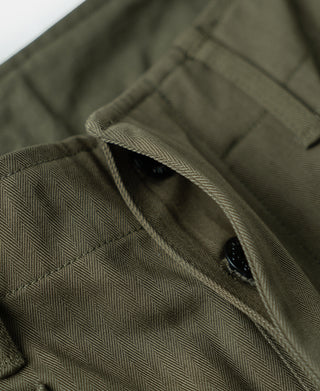 Olive HBT fabric trouser with pocket opening and textured weave